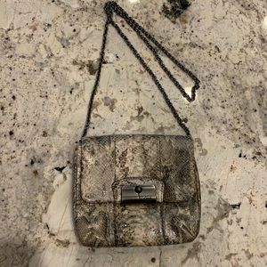 Coach snakeskin crossbody purse.